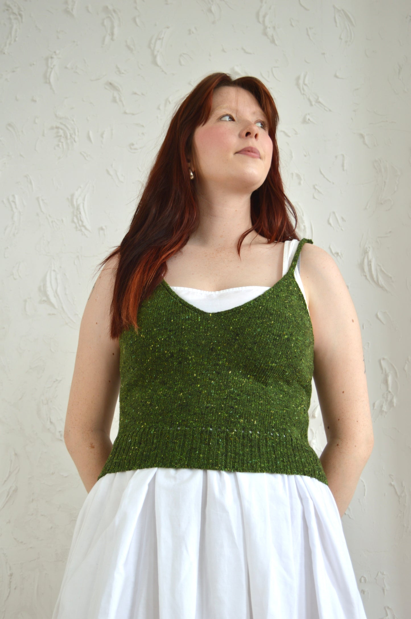 Model wearing the Tie Cami in green