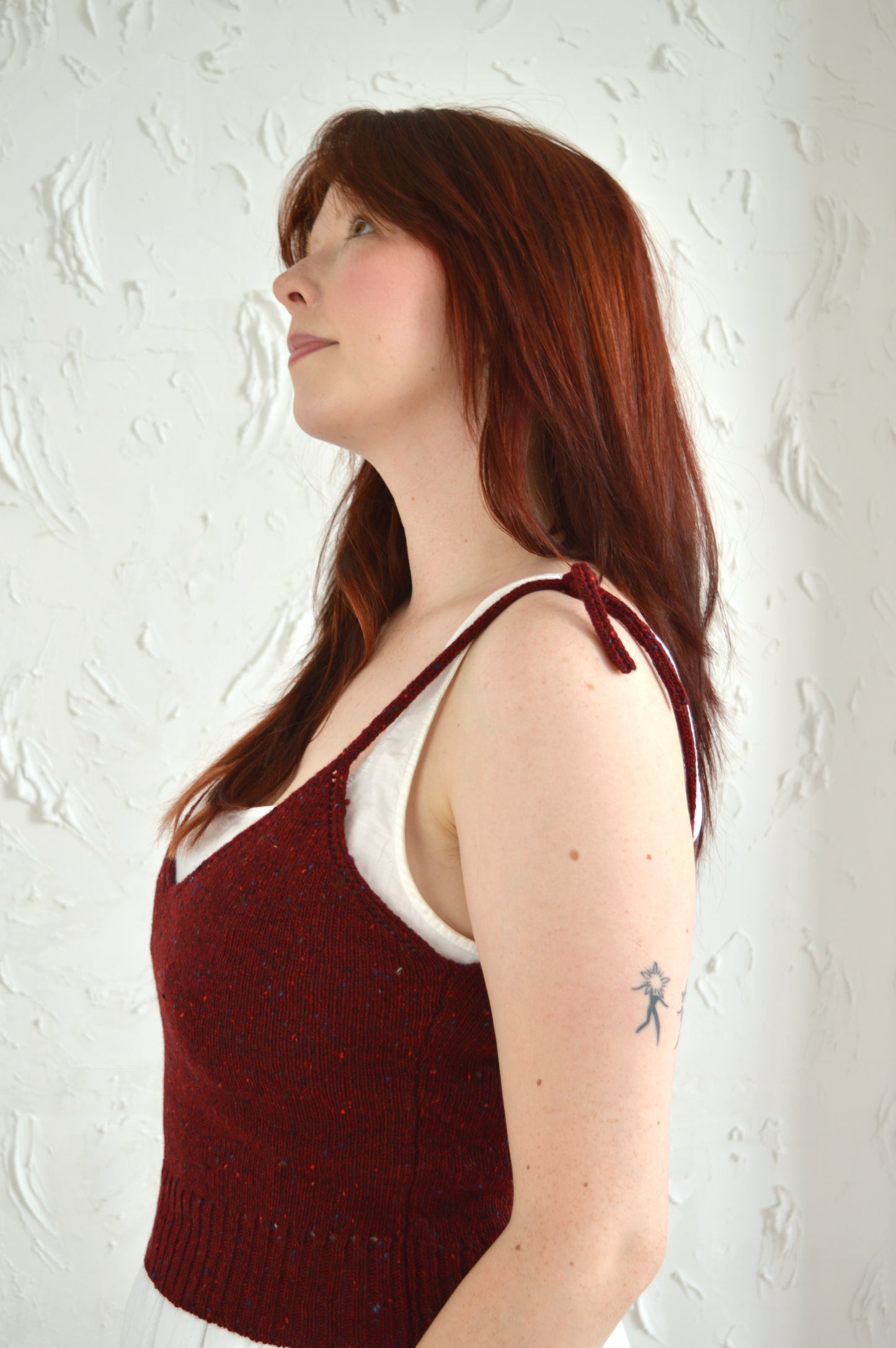 Side angle of The Tie Cami in red