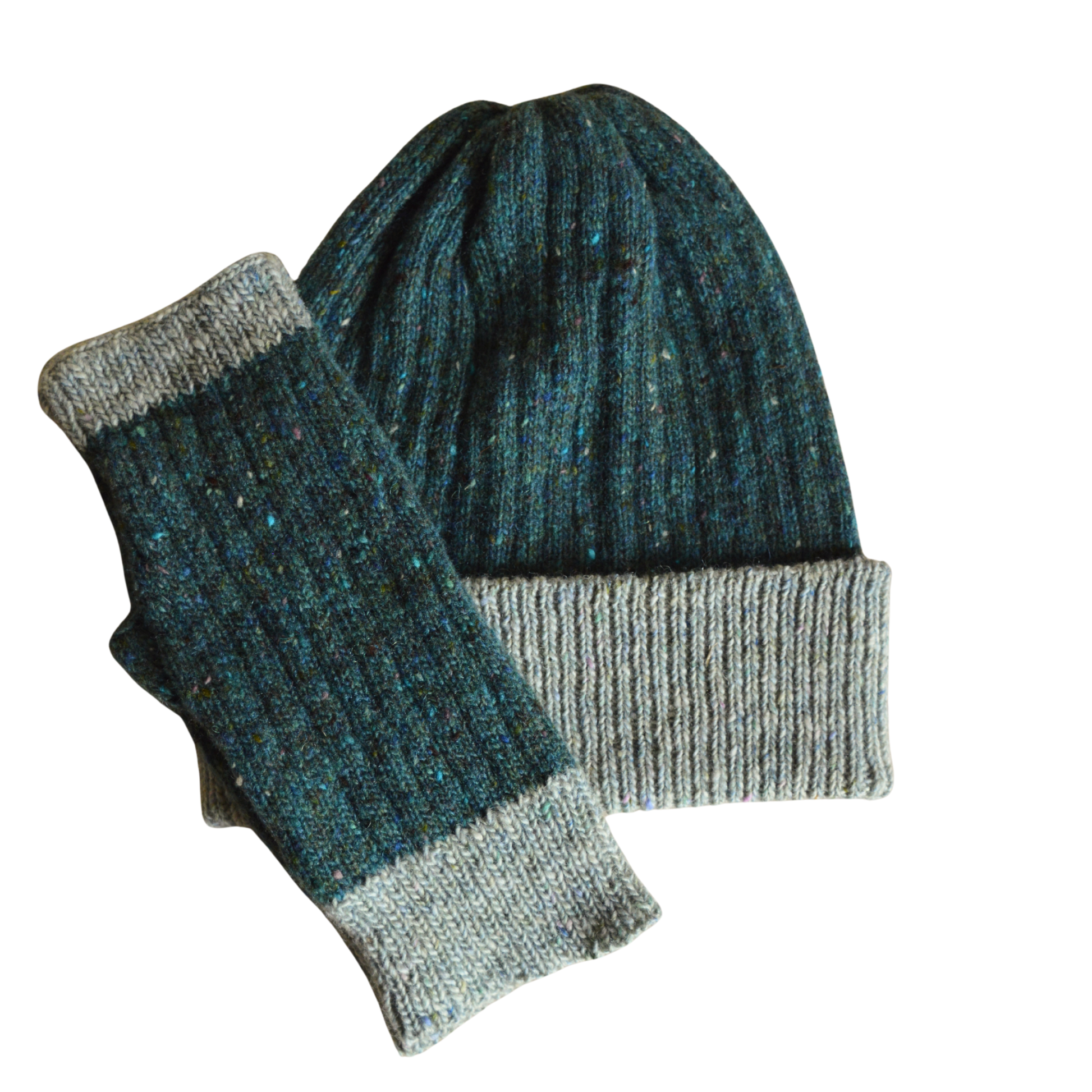 Knitted beanie and fingerless glove set with teal and light grey pattern on a white background